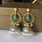 Dual-Tone Pearl Jhumka Earrings with Green Stone Drop