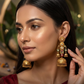 Vintage Gold-Plated Grand Temple Jhumka Earrings with Kundan & Emerald Detailing